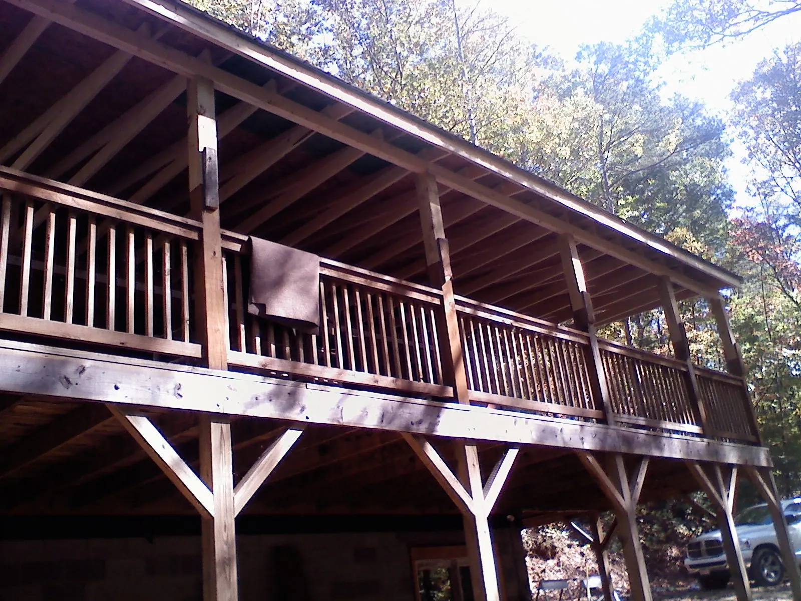 Timber framing under a new elevated porch and deck — Roof Leak Repair in Meldrim by Roofing Brothers